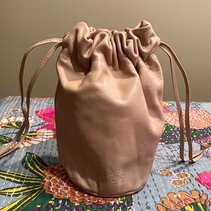 Alma Weaving Woven removable leather satchel with a tie closure